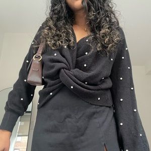 black sweater with rhinestone detailing